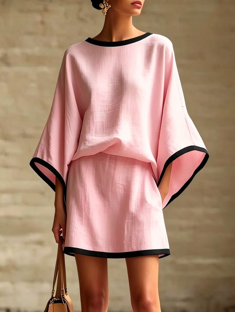 Conjunto de dos piezas para mujer con mangas murciélago y manga corta.