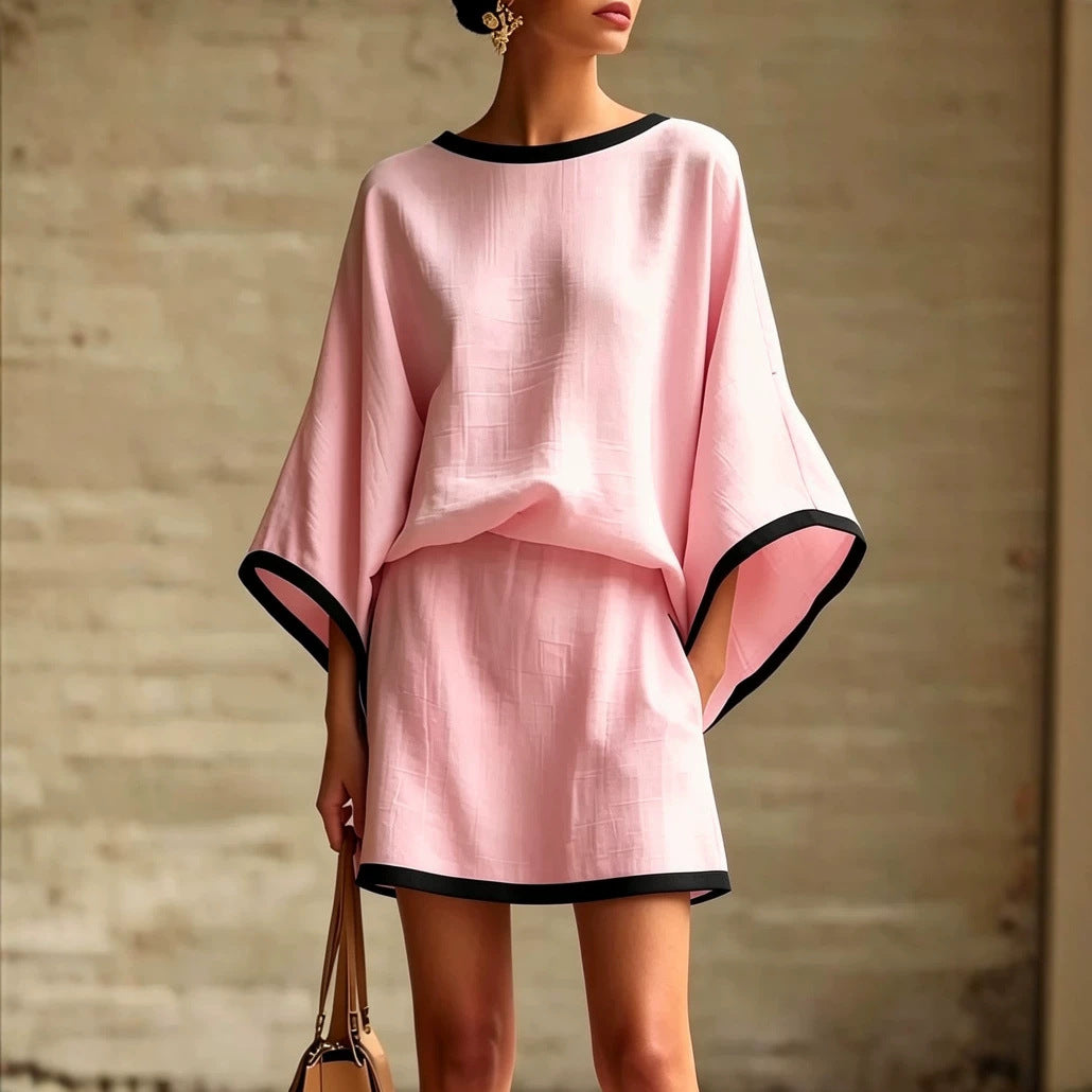 Conjunto de dos piezas para mujer con mangas murciélago y manga corta.